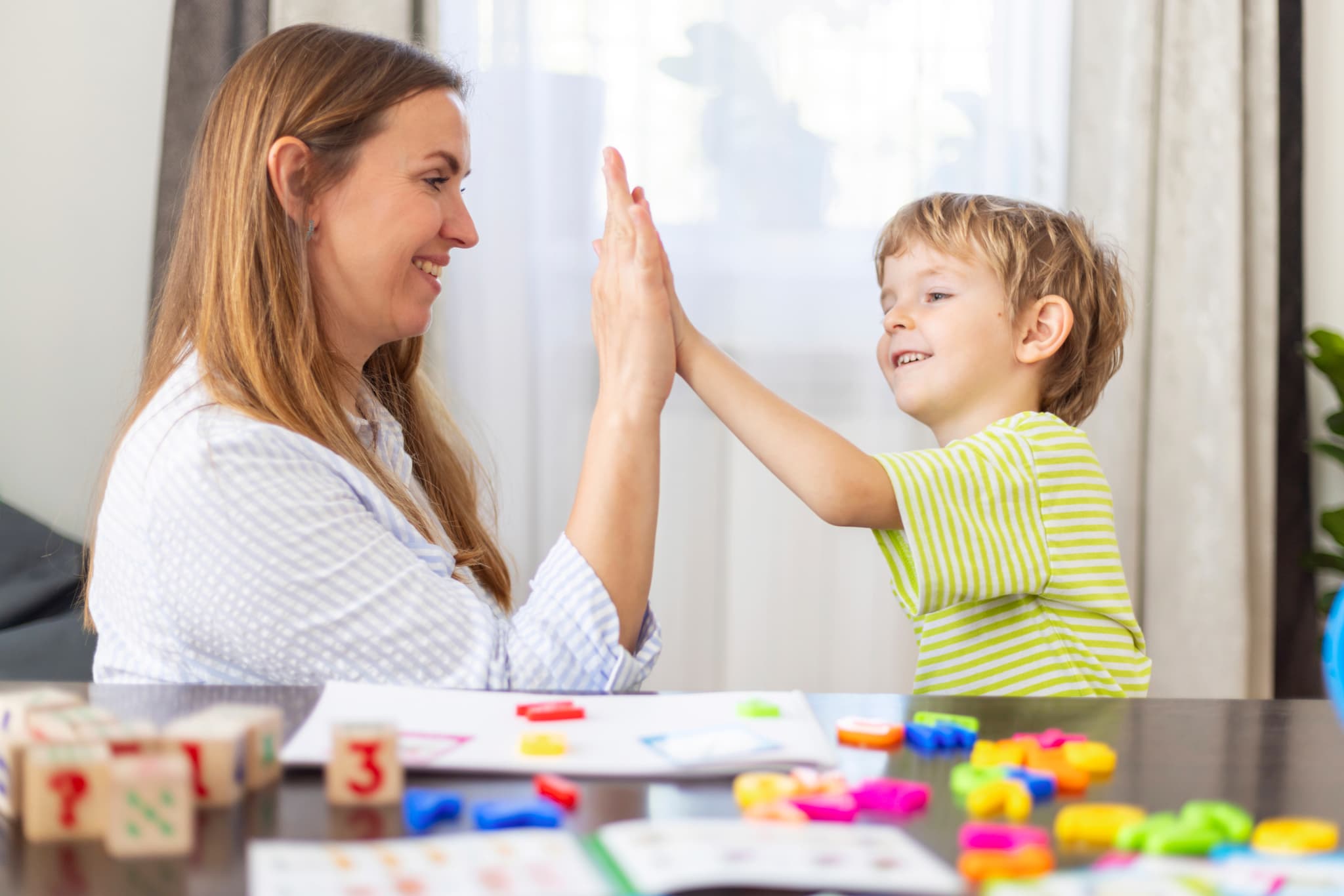 Happy family with autism therapy support